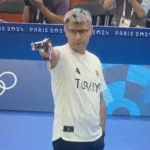 Turkey’s Olympic shooter, without specialised gear and hand in pocket, is now an internet sensation.